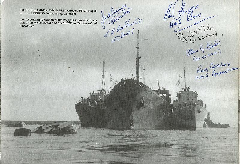 Ohio being towed by two destroyers